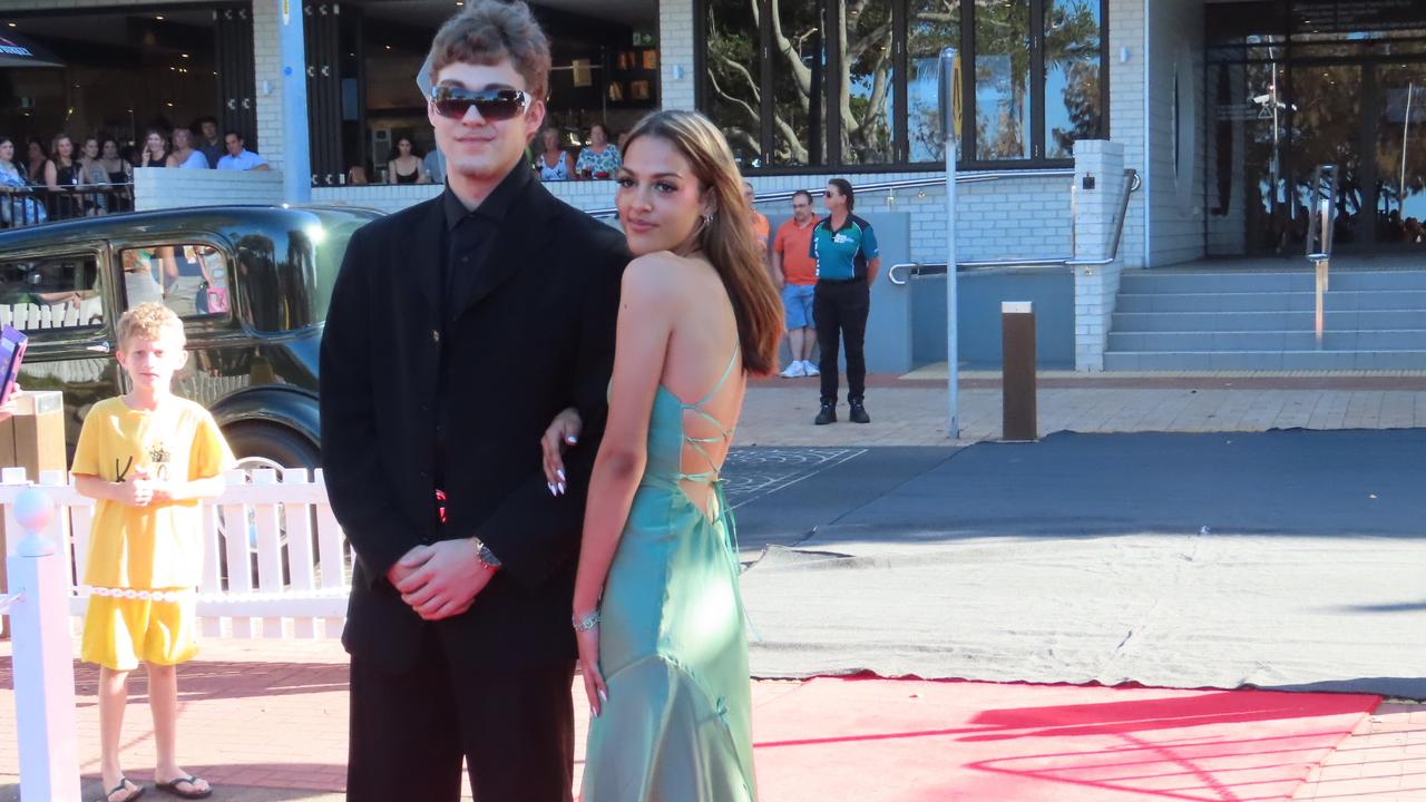 The students from Urangan State High School celebrating their formal.