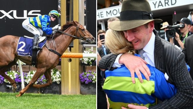 Jamies Kah scored an emotional win aboard Another Wil in The Damien Oliver at Flemington, and is gets a hug by trainer Ciaron Maher. Pictures: Getty Images