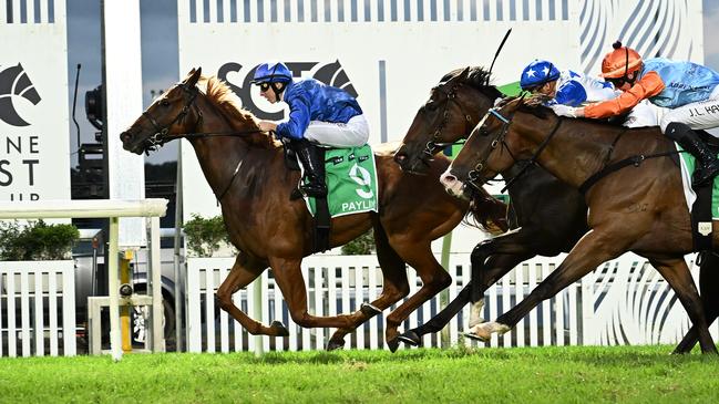 Payline launches from last to win The Syndicate for jockey Damian Lane and trainers Chris and Corey Munce. Picture: Grant Peters / Trackside Photography