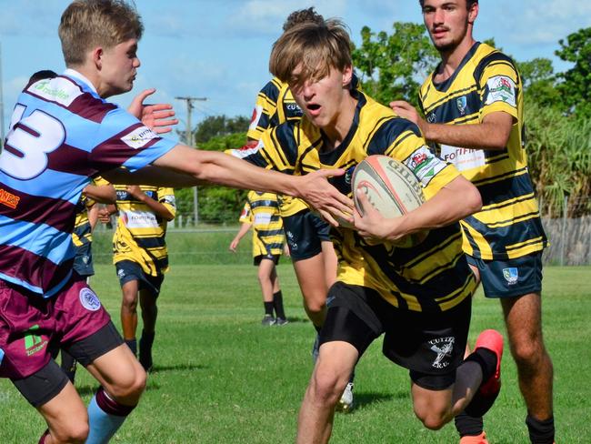 Ingham rugby player Nicholas Finocchiaro returns the ball, supported by fellow Ingham rugby player Ethan Carbone. Townsville-based James Cook University (JCU) have launched a junior rugby club in combination with Townsville Western Suburbs Rugby Union (the Dragons) and Ingham Rugby Club (Cutters) to help ensure the growth of rugby union in North Queensland. A number of junior teams and the Cutters were in action Saturday. Picture: CAMERON