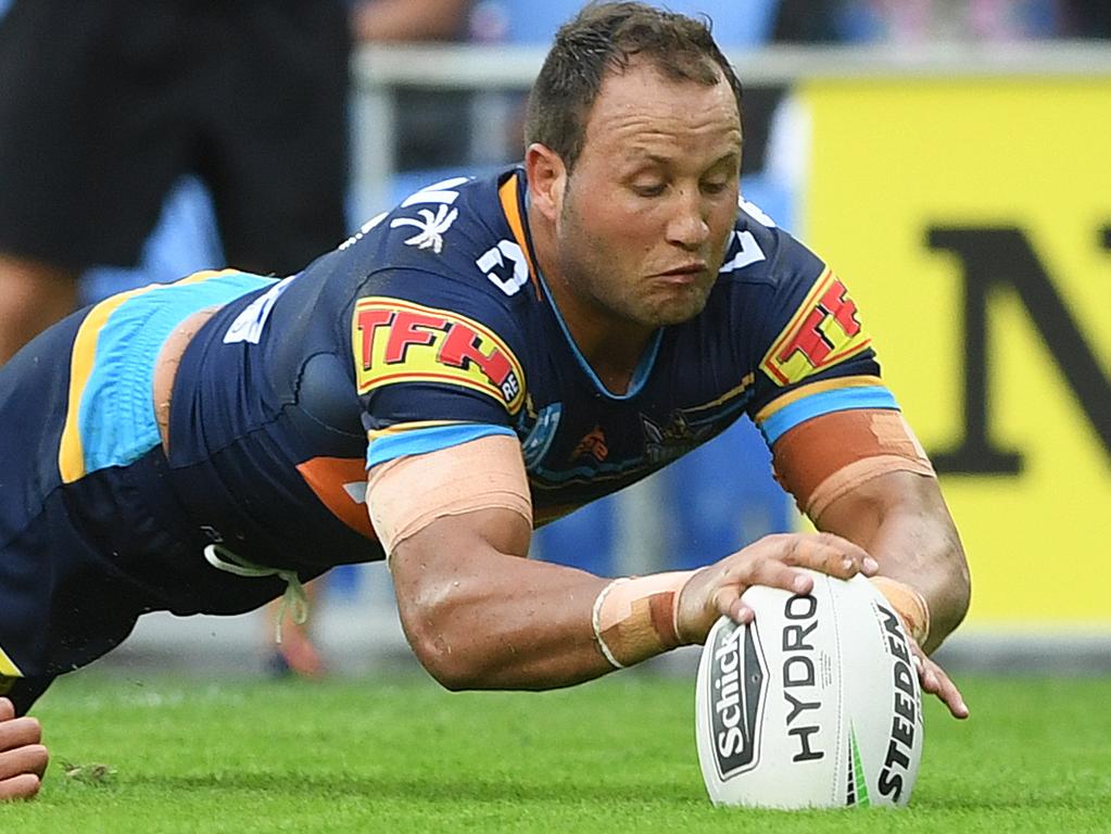 Tyrone Roberts  of the Titans scores his second try during the Round 6 NRL match between the Gold Coast Titans and the Newcastle Knights at CBUS Stadium on the Gold Coast, Sunday, April 21, 2019.  (AAP Image/Dave Hunt) NO ARCHIVING, EDITORIAL USE ONLY