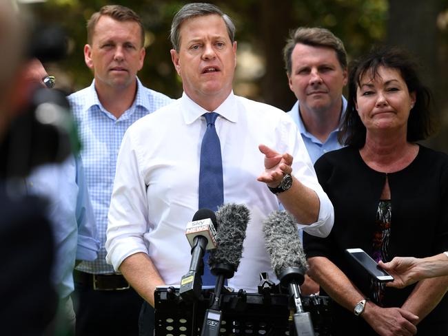 Opposition Leader Tim Nicholls: “We are focused on delivering a majority government and the LNP is the only party that will be able to deliver a majority government ...” Pictured left to right: Scott Emerson, Member for Moggill, Dr Christian Rowan and the Member for Mt Ommaney, Tarnya Smith. Picture: AAP Image/Dan Peled