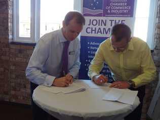 Toowoomba Chamber of Commerce and Industry president Andrew Wielandt and Toowoomba Liquor Industry Action Group president Brad Fitzgibbons signing the Memorandum of Understanding between the two organisations. Picture: Contributed