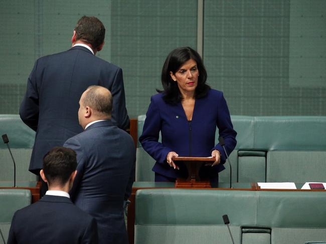 Liberal MPs walking past Julia Banks after she resigned. Picture: Gary Ramage