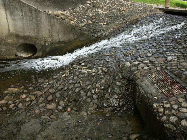 Children trapped in drain found as rain continues