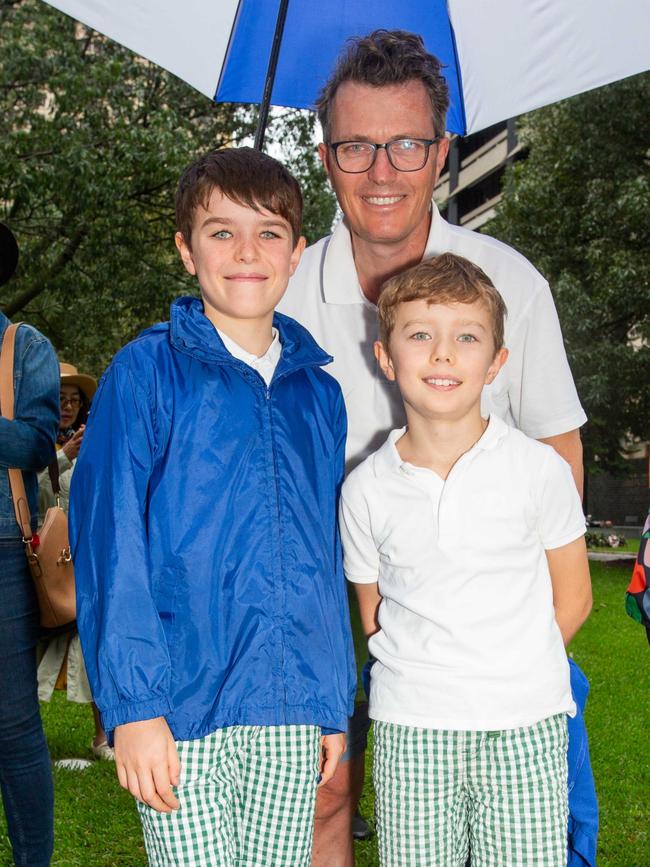Thousands of people have braved the rain to gather in Brisbane for Anzac Day services. Picture: Grace Kessels