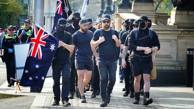 A group of neo-nazi sympathisers attempt to join the No to the Voice protestors during a rally in Melbourne. Picture: NCA NewsWire / Luis Enrique Ascui