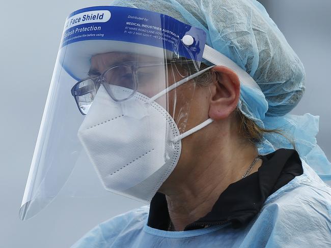 MELBOURNE, AUSTRALIA - NewsWire Photos SEPTEMBER 18, 2020:   Health workers are seen in full PPE at a pop-up COVID19 test site in Clyde, Melbourne, Victoria. Picture: NCA NewsWire / Daniel Pockett