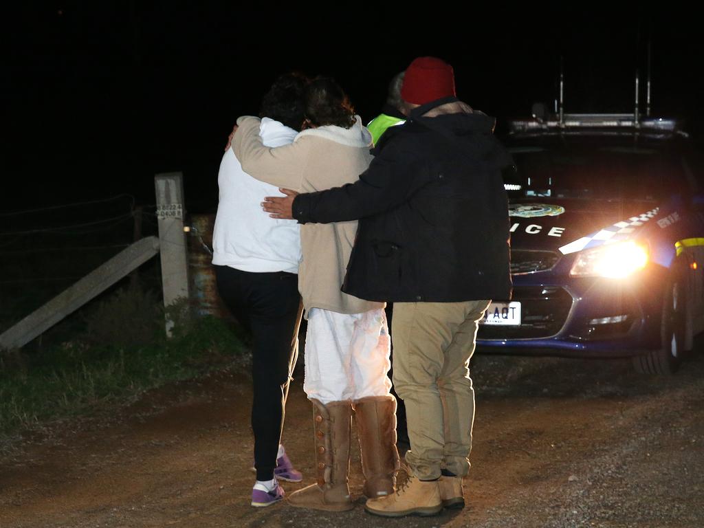 Family members arrive at the house in Hillier, shortly after the grim discovery. Picture: Stephen Laffer