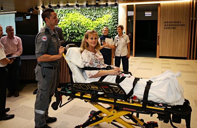 Test patient Lisa McEvoy being moved from Manly hospital to the Northern Beaches Hospital. Picture: Adam Yip