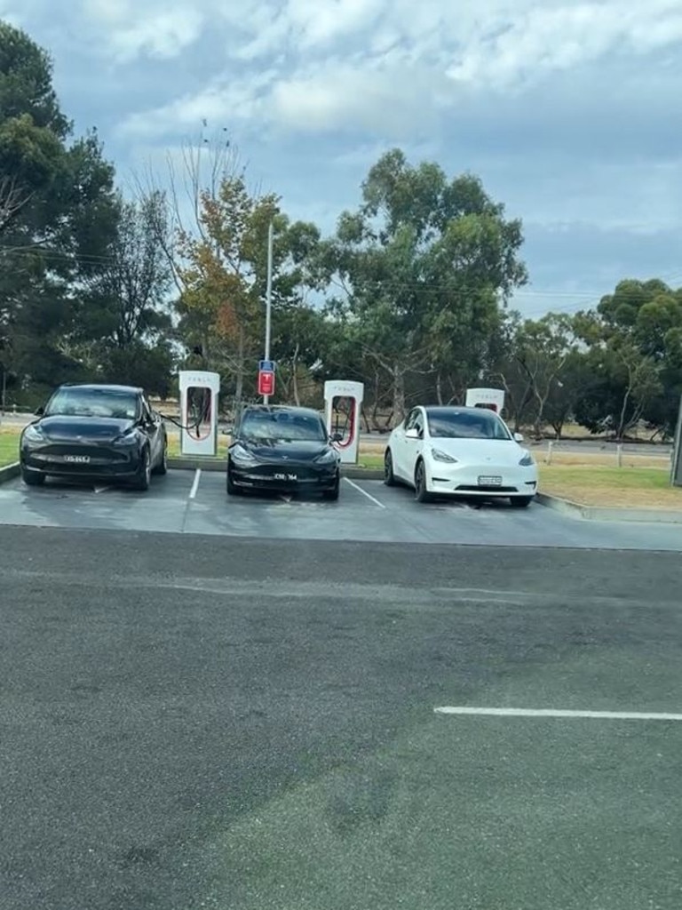 A screenshot of a clip showing a long queue of Teslas waiting for a charging station spot in Keith in rural South Australia. Picture: @pauylyohh83