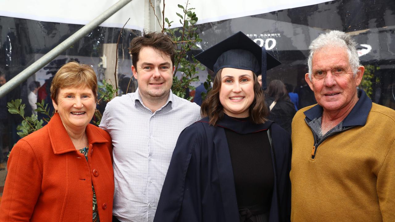 Deakin graduate Melanie Nelson with parents Julie and Billy boyfriend Adrian Burke. Picture: Alison Wynd