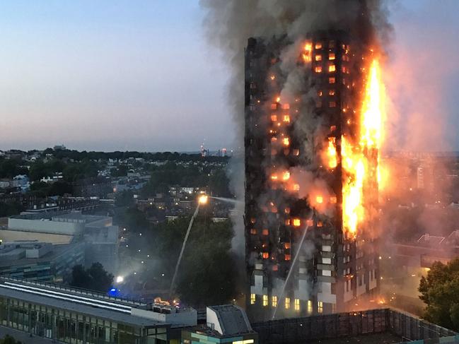 (FILES) This file handout photo received from local resident Natalie Oxford early on June 14, 2017 shows flames and smoke coming from a 27-storey block of flats after a fire broke out in west London. - Grenfell survivors and families of the 72 victims will come together and remember their loved ones two years after the tower block fire.  June 14, 2019 marks 24 months since a small kitchen fire in a west London high-rise turned into the most deadly domestic blaze since the Second World War. (Photo by Natalie OXFORD / Natalie Oxford / AFP) / -----EDITORS NOTE --- RESTRICTED TO EDITORIAL USE - MANDATORY CREDIT "AFP PHOTO / Natalie Oxford" - NO MARKETING - NO ADVERTISING CAMPAIGNS - DISTRIBUTED AS A SERVICE TO CLIENTS - NO ARCHIVES