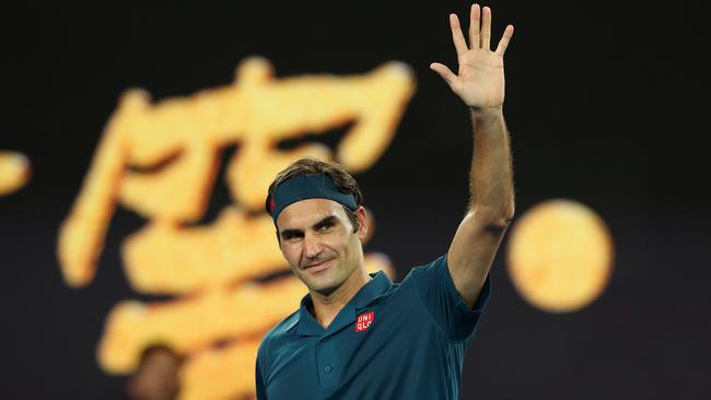 Roger Federer of Switzerland celebrates winning against Denis Istomin of Uzbekistan during day one of the Australian Open tennis tournament in Melbourne, Monday, January 14, 2019. (AAP Image/David Crosling) NO ARCHIVING, EDITORIAL USE ONLY