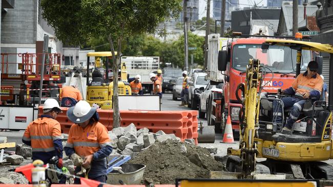 Construction crews working in inner Melbourne. Picture: Andrew Henshaw