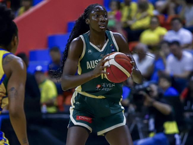 Australia's player Ezi Magbegor controls the ball during the women's Pre-olympic Tournament match between Brazil and Australia at the Arena Guilherme Paraense in Belem, Para state, Brazil on February 8, 2024. (Photo by THIAGO GOMES / AFP)