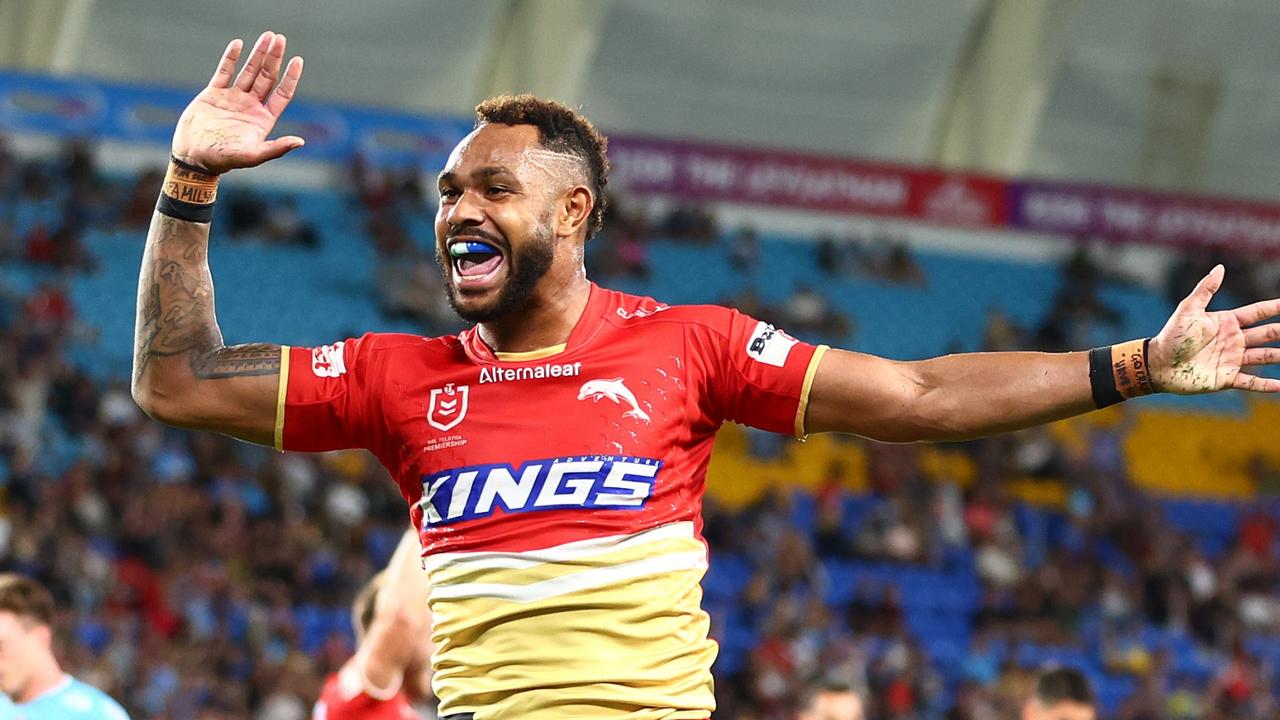 GOLD COAST, AUSTRALIA - MARCH 30: Hamiso Tabuai-Fidow of the Dolphins celebrates a try during the round four NRL match between Gold Coast Titans and Dolphins at Cbus Super Stadium, on March 30, 2024, in Gold Coast, Australia. (Photo by Chris Hyde/Getty Images)