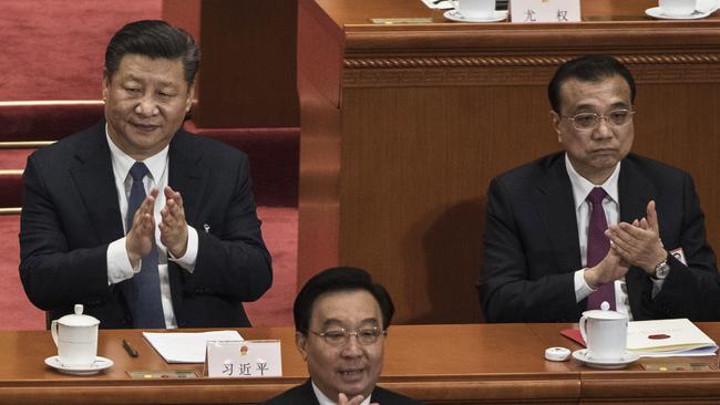 Chinese politicians abolished presidential term limits and paved the way for Xi Jinping to rule indefinitely. Picture: Kevin Frayer/Getty Images