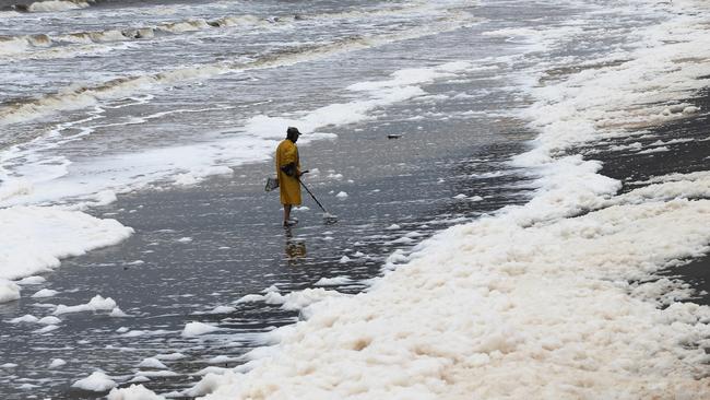 Sea foam at Stockton Beach. Picture: NCA NewsWire/Peter Lorimer.