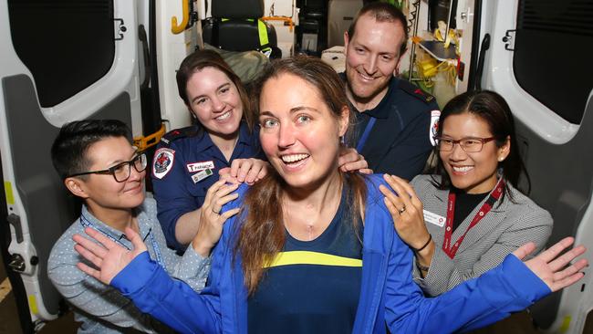 Petra with paramedics and cardiac medical staff who saved her life, Dr Li Tan Intensive Care Specialist, Georgia Barker Paramedic, Simon Fraser Mica Paramedic and Dr Angeline Leet Cardiologist. Picture: David Caird