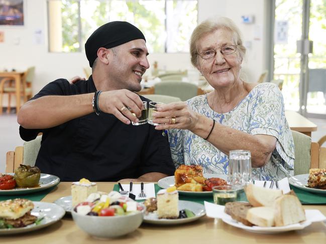 The yummy food at the Greek Community Home For The Aged in Sydney. Chef Panayiotis Giannakopoulos with resident Adele Koutsoukos (right). Picture: Sam Ruttyn