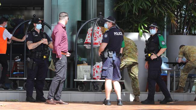 Police and army in front of the Sofitel serve as a reminder to keep up your social distancing up. Picture Glenn Hampson