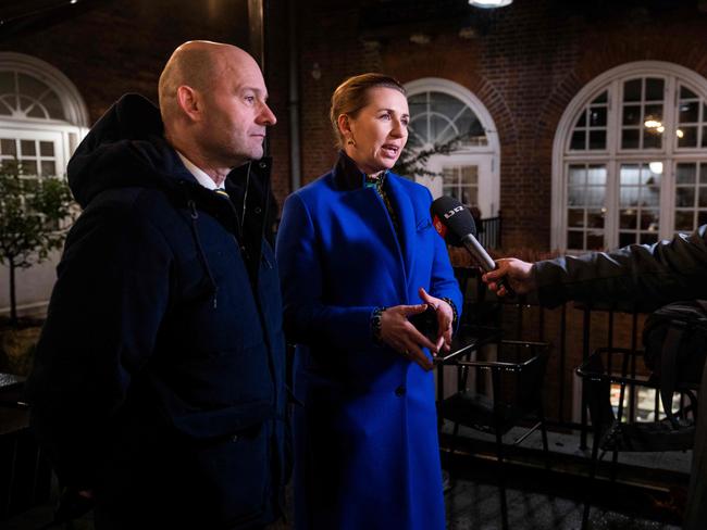 Denmark's Prime Minister Mette Frederiksen and chairman of the Conservative People's Party Soren Pape Poulsen speak to journalists as they meet for a meal after Denmark becomes the first EU country to lift coronavirus restrictions despite record case numbers. Picture: AFP