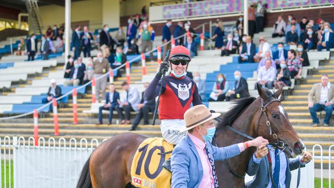 Jockey Ben Thompson brings 10 Purrfect Deal back to scale after winning the 2021 Grafton Cup at the Clarence River Jockey Club July Carnival.