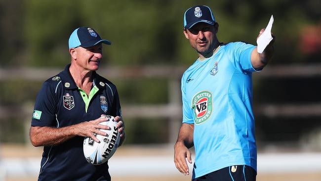 Peter Sterling chats with Boues coach Laurie Daley. Picture: Brett Costello