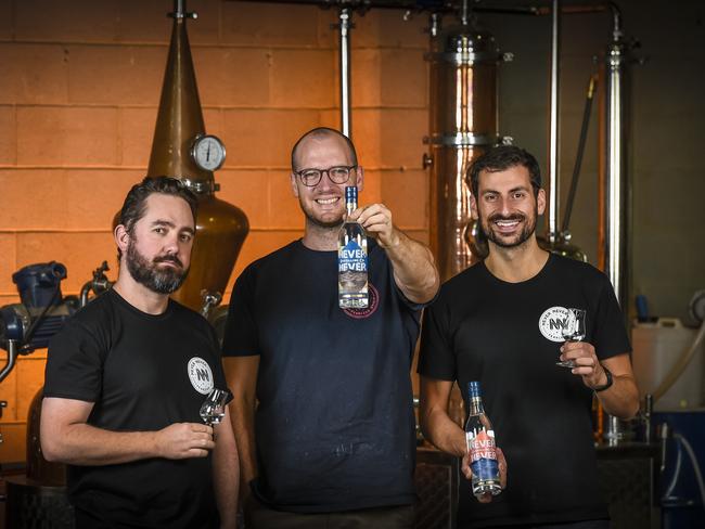 Never Never distilling‘s Sean Baxter, Tim Boast and George Georgiadis. Photo: AAP/Roy VanDerVegt