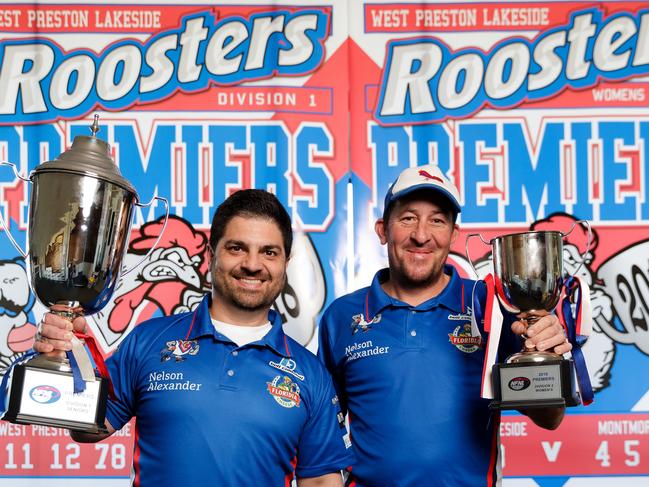 Premiership coaches Rob Maiorana and Brett Pollard show off their silverware. Picture: Mark Dadswell.