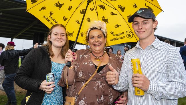 At the Clifton Jockey Club Clifton Cup races are (from left) Maddie Lucas, Kellie Saville and Ryan Saville, Saturday, October 22, 2022. Picture: Kevin Farmer