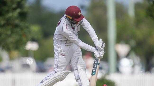 Toombul’s Preston White defends. Photos by Stephen Archer