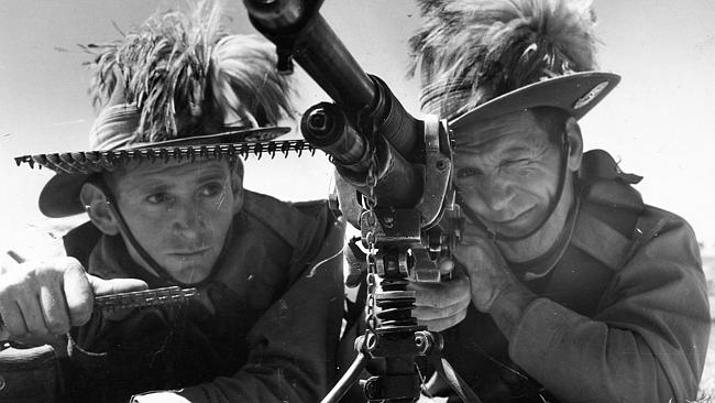  Australian Army machine gunners. Machine gun firing at Port Range by Light Horsemen from Gawler Camp. Undated. Hodgkins Gun,...