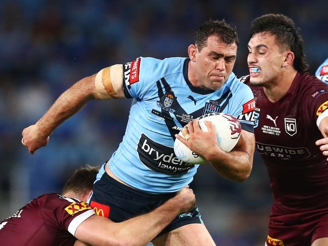 GOLD COAST, AUSTRALIA - JULY 14: Dale Finucane of the Blues is tackled during game three of the 2021 State of Origin Series between the New South Wales Blues and the Queensland Maroons at Cbus Super Stadium on July 14, 2021 in Gold Coast, Australia. (Photo by Chris Hyde/Getty Images)