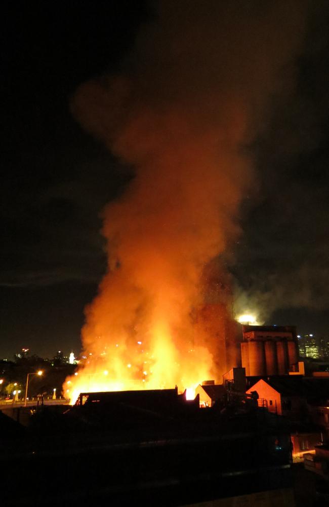 A photo showing a large fire in Cremorne early this morning which started close to the Nylex sign. Picture: Kiah Doodie