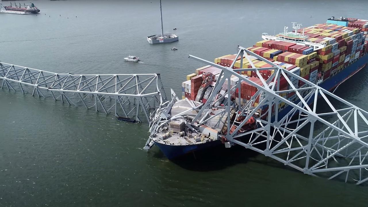 An image from the National Transportation Safety Board shows part of the steel frame of the Francis Scott Key Bridge sitting on top of the container ship Dali after the bridge collapsed in Baltimore, Maryland. Picture: AFP