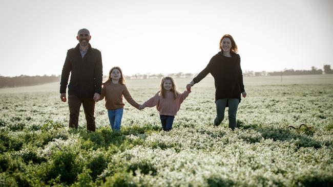 The happy Lawson family enjoy an early morning photo shoot in the lentils. Picture: Matt Turner.