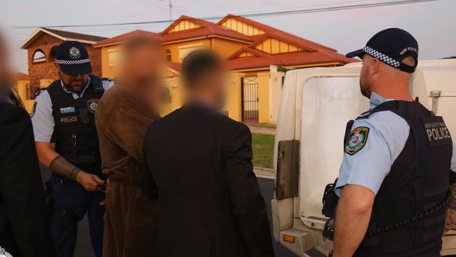 The three men were arrested in early-morning raids on Thursday. Picture: NSW Police