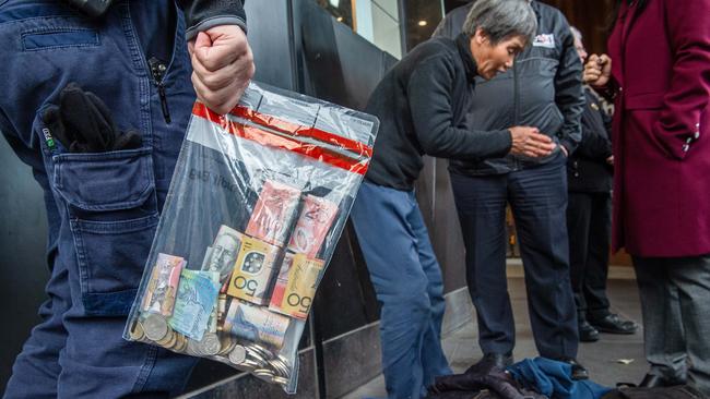 Police seized hundreds of dollars during the operation. Picture: Jason Edwards