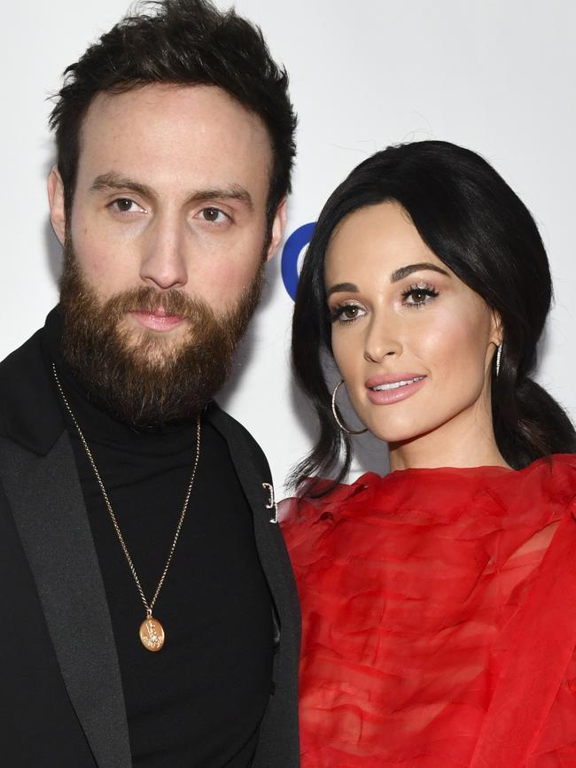 One of the night’s big winners, Kacey Musgraves and her husband Ruston Kelly at the Universal party. Picture: Getty Images