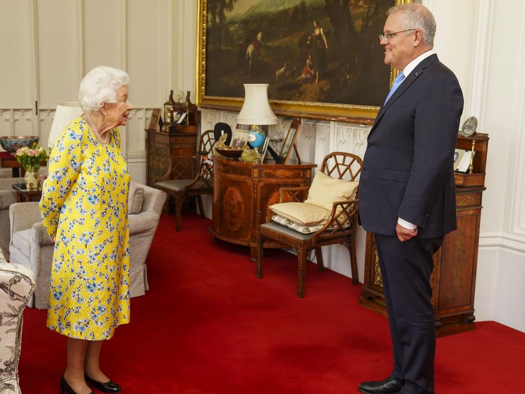 Queen Elizabeth II receives Australian Prime Minister Scott Morrison during an audience in the Oak Room at Windsor Castle.