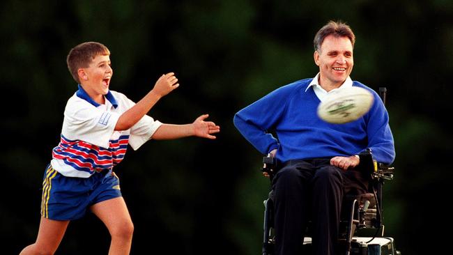 Former Penrith player John Farragher who became a quadriplegic when injured in scrum during game with Newtown in 1978. He’s pictured here with a 10-year-old Jacob in 1998.