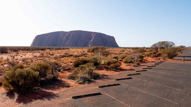 Empty parking bays at Uluru-Kata Tjuta National Park. Picture David Curl.