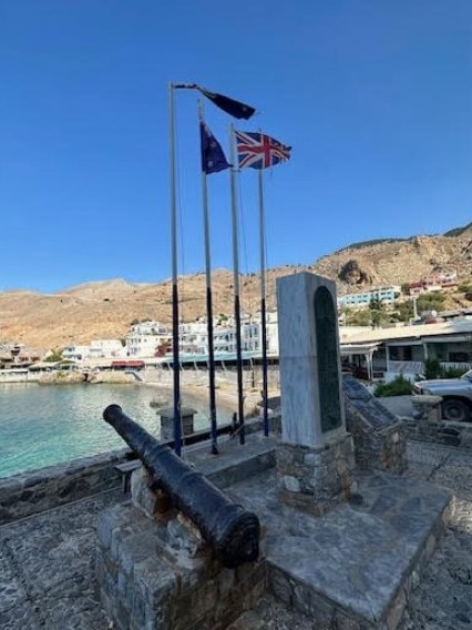 The Australian flag flies at the port town of Sfakia in Greece.