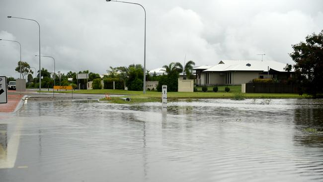 Flooding across Townsville. Lower Bridge closed on the Bohle River as overflow covers the road. Picture: Alix Sweeney