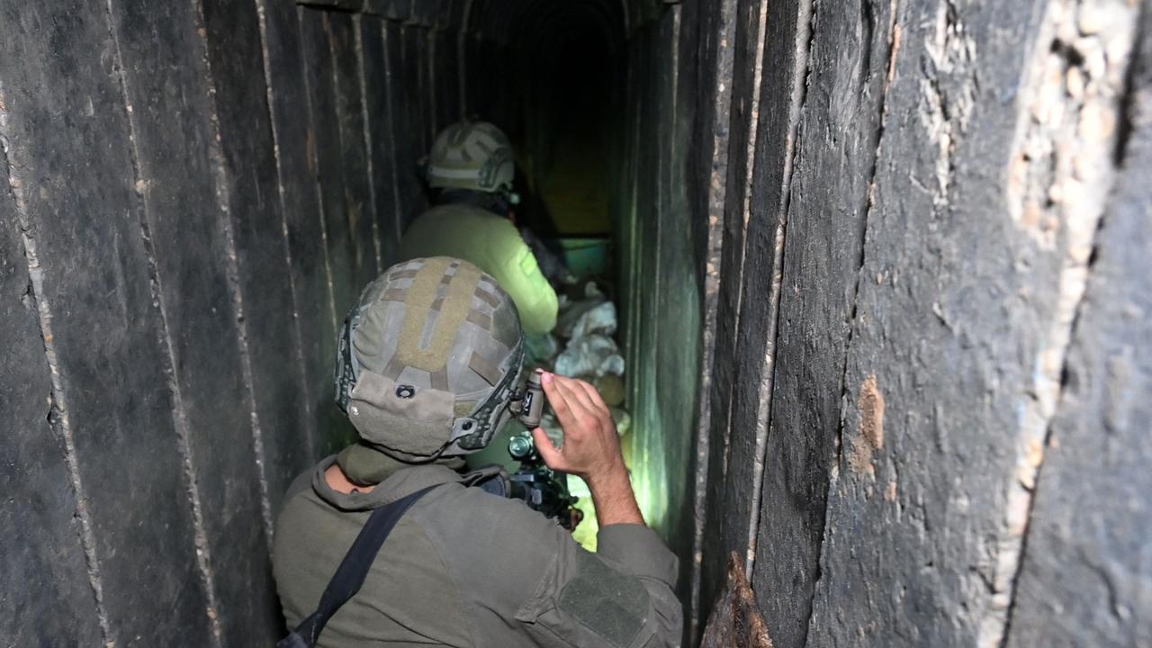 Soldiers explore the tunnel. Picture: Ahikam Seri/AFP