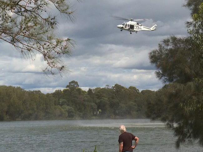 A police search is underway for two children reportedly in the water at Lansvale, in Sydney's southwest. Picture: TNV