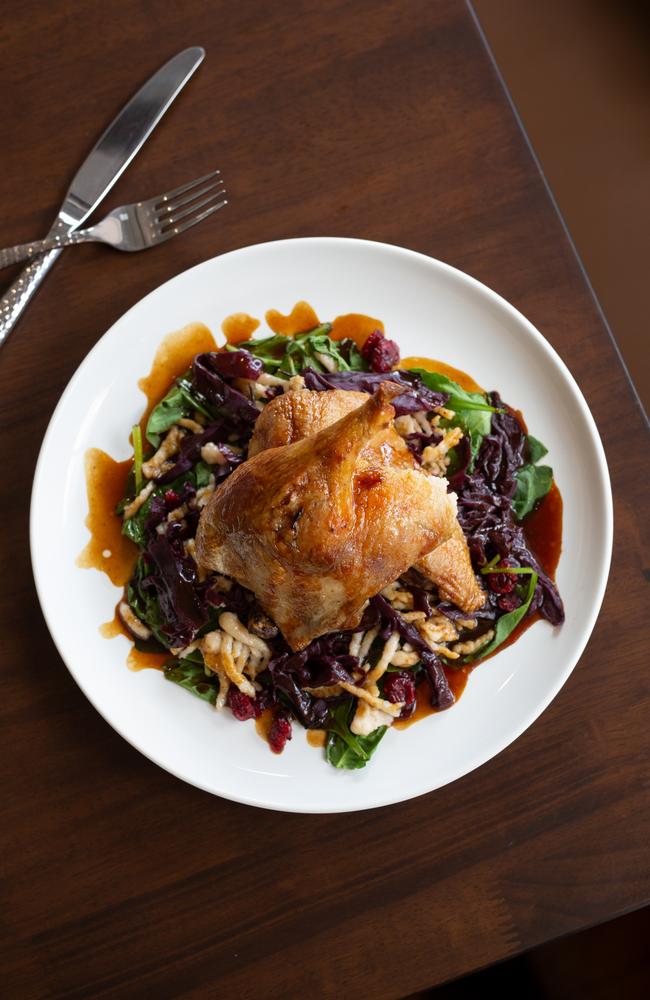 Generous serve: Oven-roasted duck, braised red cabbage, speatzle and port wine jus at Le Coin Bistro at Red Hill. Picture: David Kelly.