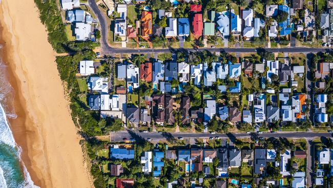 Suburban roof tops with beach; Australian housing overhead generic